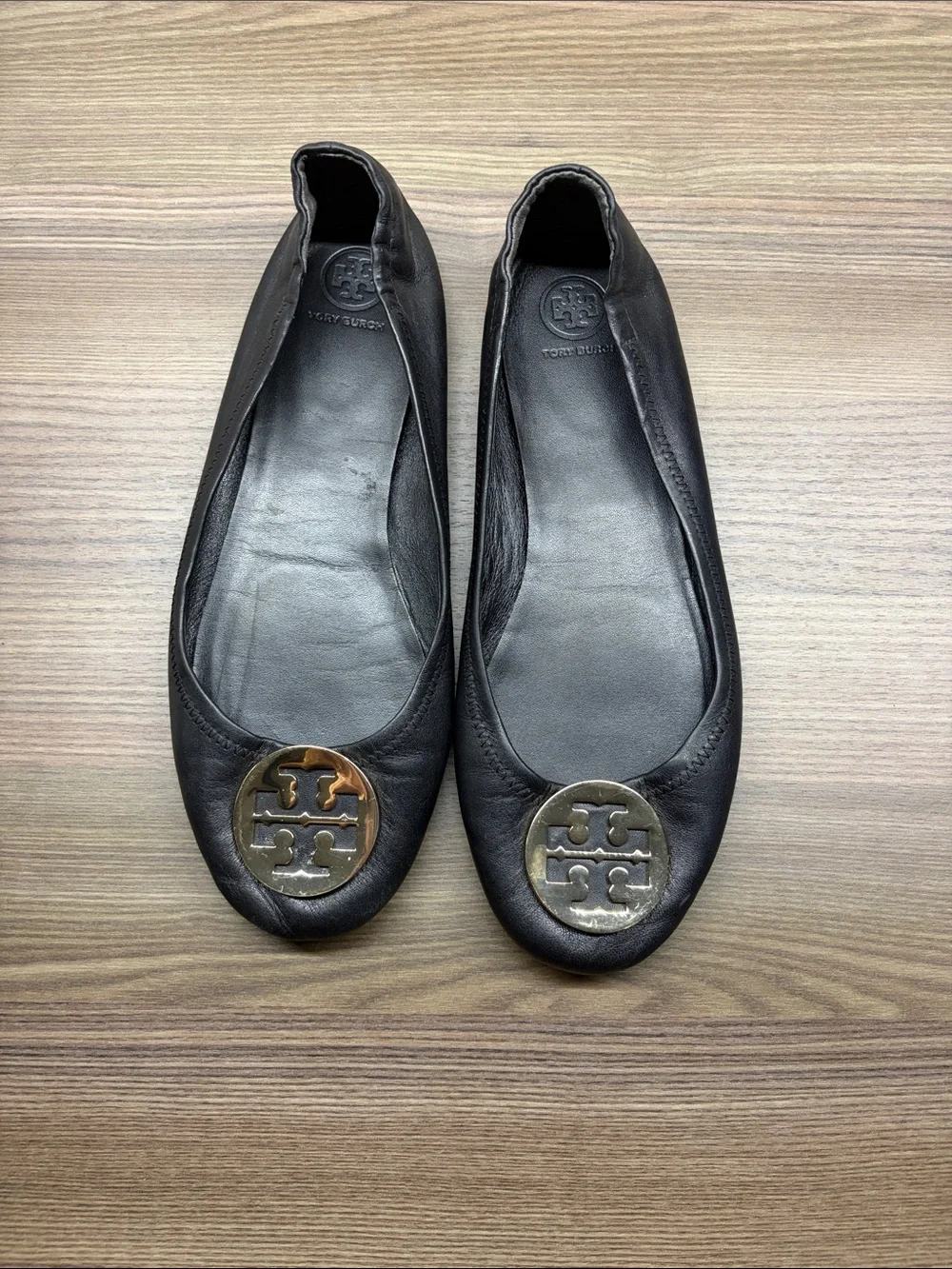 Tory Burch Black Leather Logo Medallion Flats with Gold Emblem